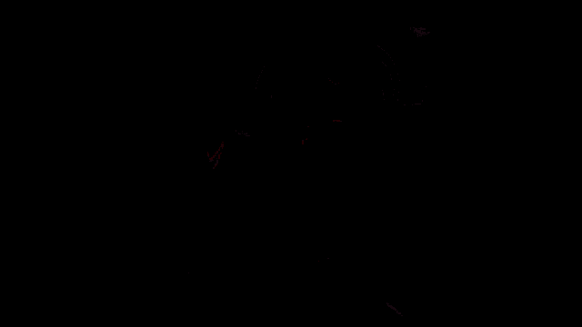 a bottle of coca cola sits next to a man in a dark room