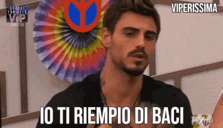 a man says io ti riempio di baci in a video