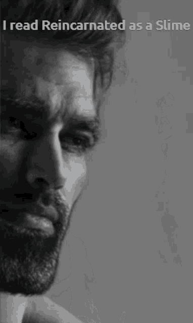 a black and white photo of a man with the words i read reincarnated as a slime on the bottom