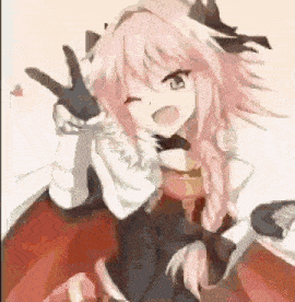 a girl with pink hair is giving a peace sign while sitting on a chair .