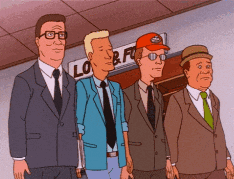 a group of men standing in front of a sign that says ' lo & f '