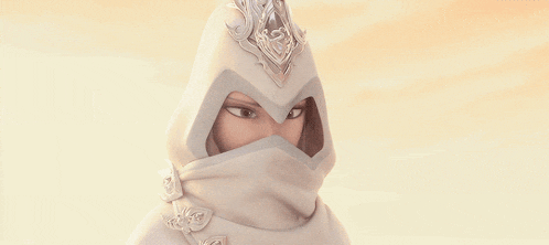a cartoon character is wearing a white hood and covering her face with a veil .