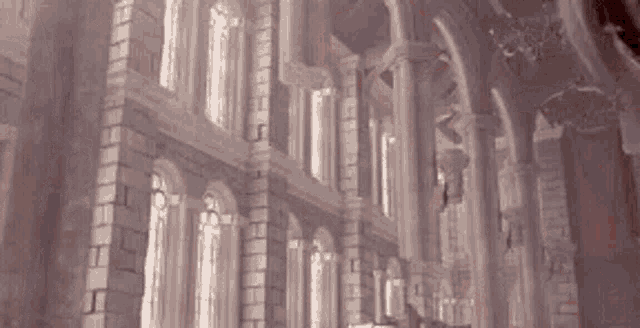 a large building with a lot of windows and columns