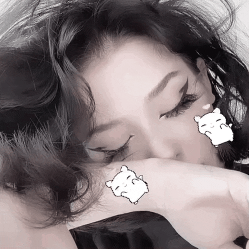a girl with a tattoo of a hamster on her face