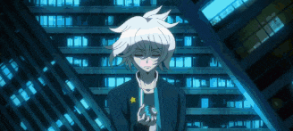 a boy with white hair is standing in front of a building