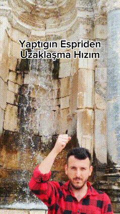 a man in a red and black plaid shirt stands in front of a waterfall with the words yaptigin espridan uzaklama hizim