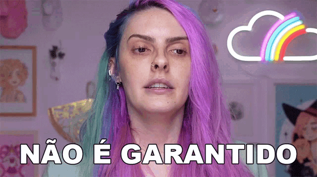 a woman with purple and blue hair says não e garantido in front of a rainbow .