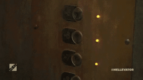 a close up of a machine with the word elevator on the bottom .