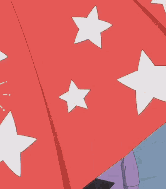a little boy in a purple jacket is holding a red umbrella