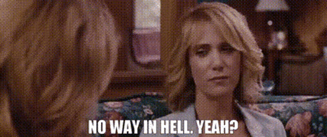 a woman is sitting on a couch with the words `` no way in hell yeah '' written on her face .