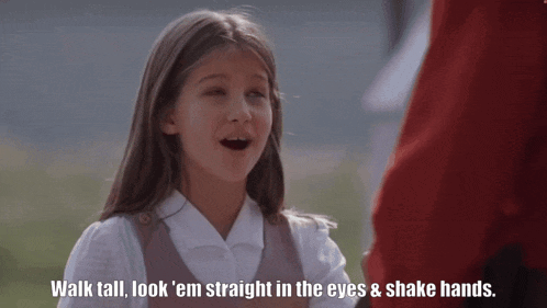 a girl in a school uniform says " walk tall look 'em straight in the eyes and shake hands "