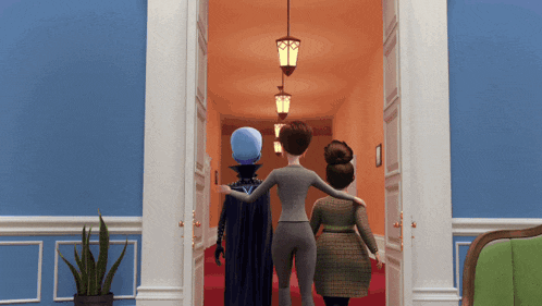 a group of people standing in a hallway with a plant in the background