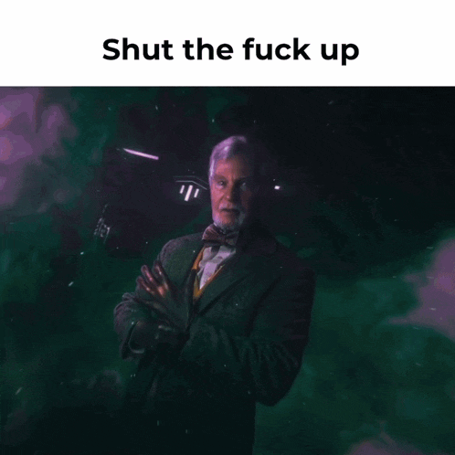 a man in a suit and bow tie with the words shut the fuck up