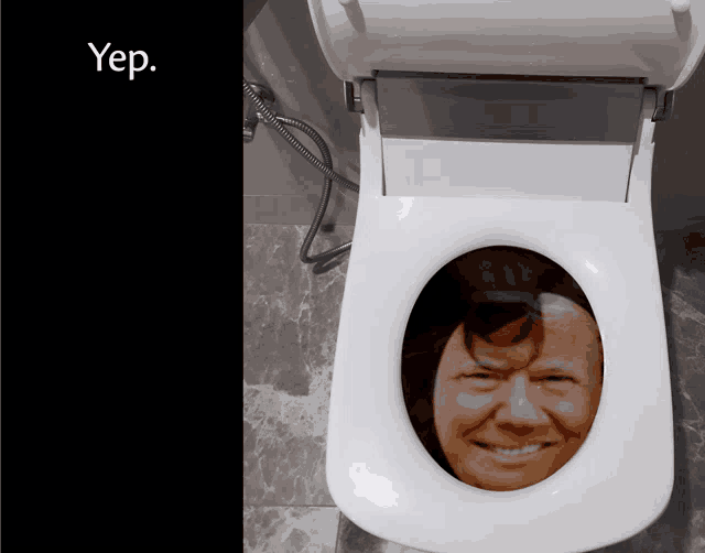 a white toilet with a picture of a man in it and the word yep below it