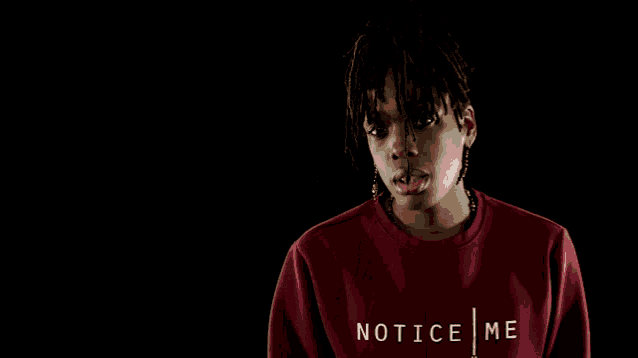 a woman wearing a red sweatshirt that says ce me on it