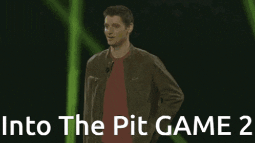 a man is dancing in the dark with the words into the pit game 2 above him