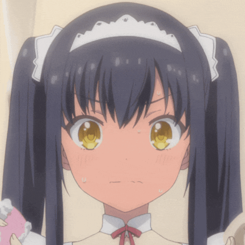 a close up of a girl with pigtails and a white headband