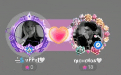 a woman and a man are sitting next to each other in a circle with a heart in the middle .