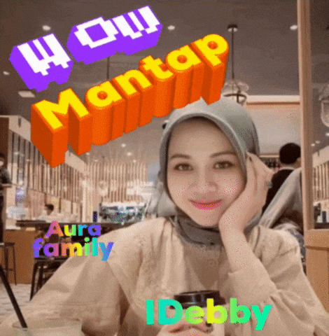 a woman sitting at a table with the words wow mantap aura family debby
