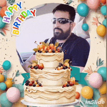 a man with a beard is holding a birthday cake with berries on it