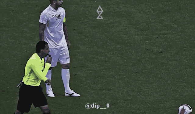 a soccer player wearing a white shirt that says gm