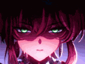 a close up of a girl with green eyes and red hair