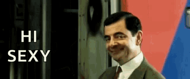 mr bean is smiling and saying hi sexy .
