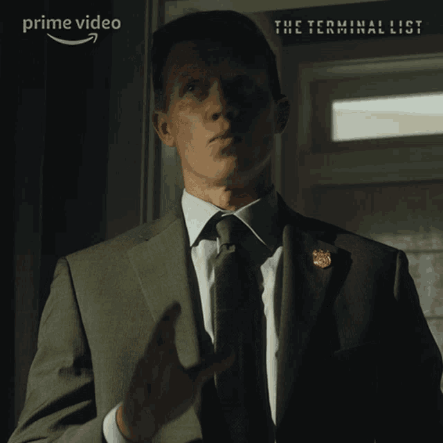 a man in a suit and tie is saying we 're workin ' on it