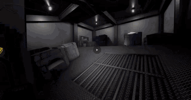 a dark room with a yellow railing and a yellow arrow pointing to the right