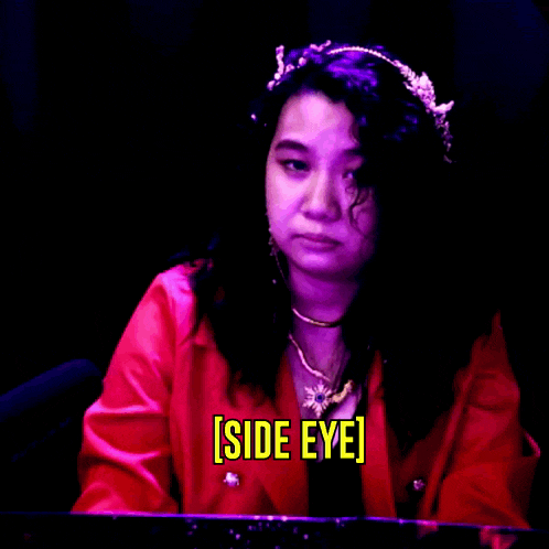 a woman in a red jacket with the words side eye written in yellow