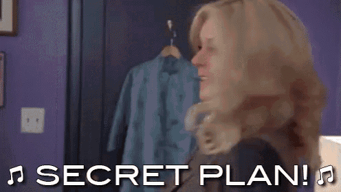 a woman is standing in front of a purple wall with the words secret plan written on it