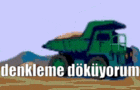a green dump truck is sitting on top of a dirt field with the words " denkleme dokuyorum " written below it .