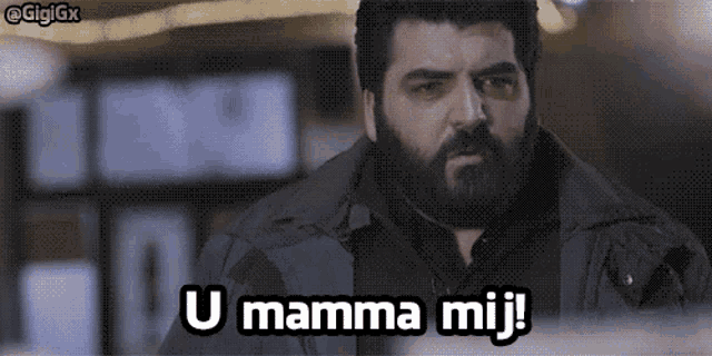 a man with a beard says ' u mamma mij '