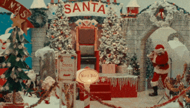 santa claus is standing in front of a sign that says santa