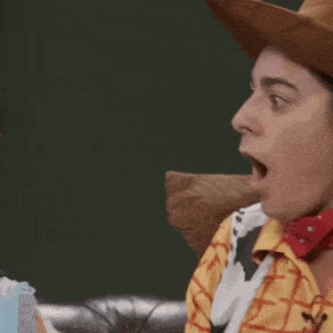 a man in a cowboy outfit is saying oh no ami