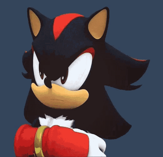 a close up of a shadow the hedgehog 's face with a blue background