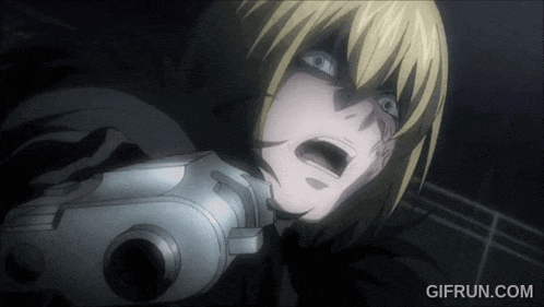 a close up of a person holding a gun with gifrun.com in the bottom right corner