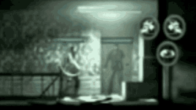 a blurry picture of a person walking through a doorway in a dark room