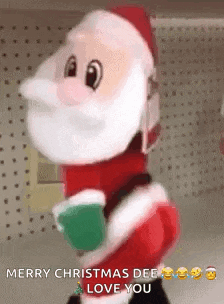 a stuffed santa claus is holding a cup of coffee and says `` merry christmas dee , i love you '' .