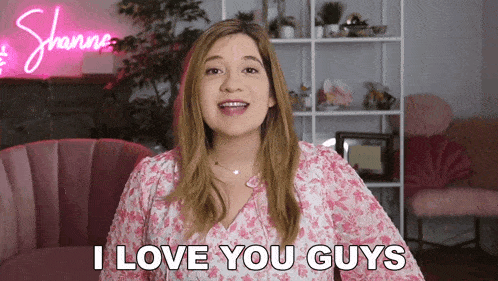 a woman says i love you guys in a pink room