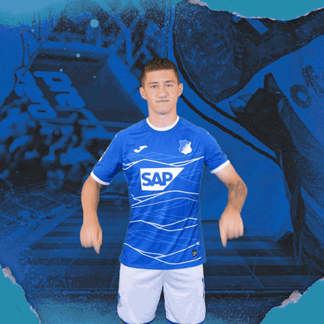 a man in a blue shirt that says sap on it