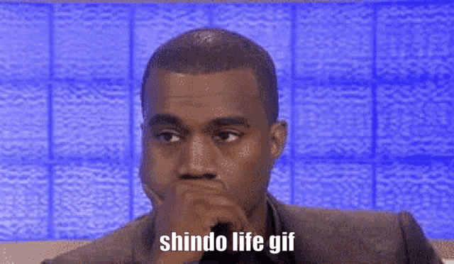 a man with his hand on his chin and the words shindo life gif written below him