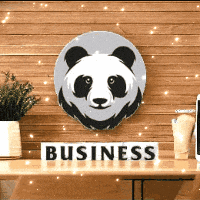 a desk with a sign that says business and a panda on it