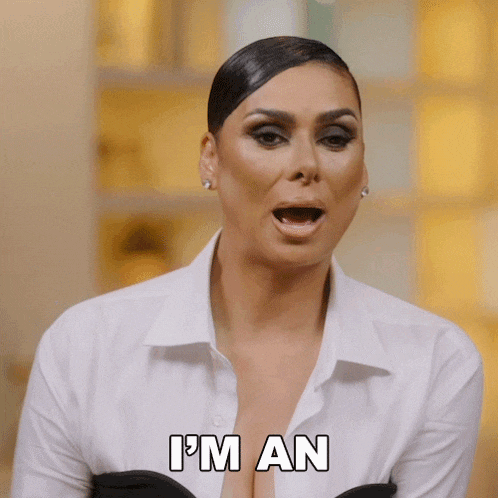 a woman says i 'm an in a white shirt