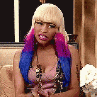 a woman with blonde hair and blue and pink hair is sitting on a couch and making a funny face .