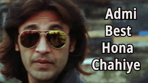 a man wearing sunglasses with the words " admir best hona chahiye " written below him
