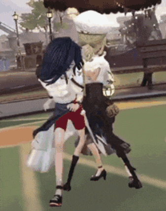 a couple of anime characters are dancing on a field .