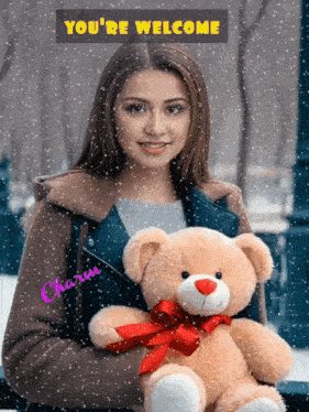 a woman is holding a teddy bear with the words you 're welcome written above her