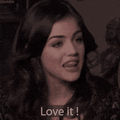 a close up of a woman 's face with the words `` love it '' next to her .