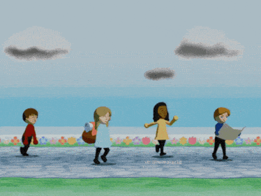 a group of people are walking down a sidewalk with flowers in the background